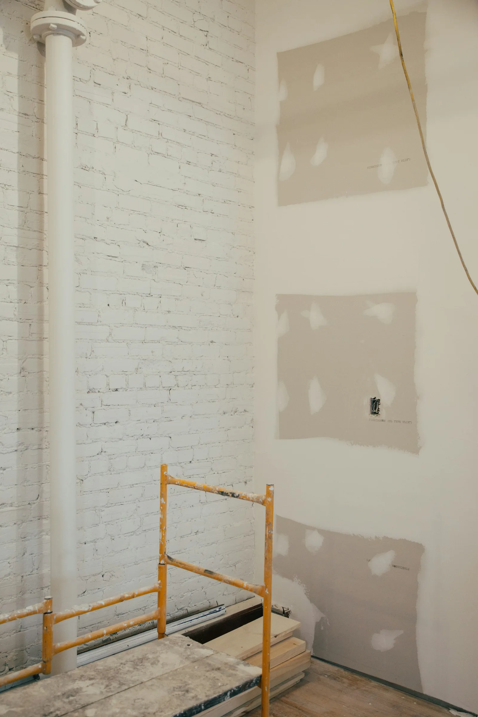 Reprises et sous-couche sur mur ancien